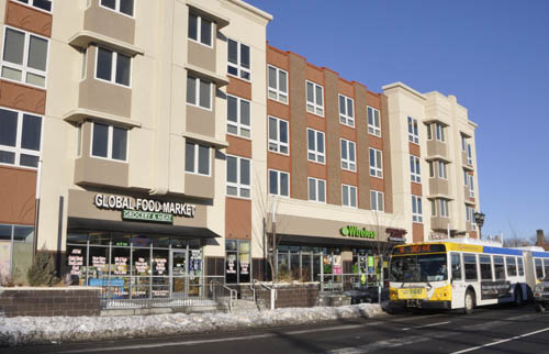 TOD integrates housing, transit, retail and services, and pedestrian access.