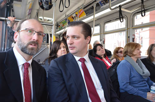 Council Chair Adam Duininck (center) chats with Will Schroeer, executive director of East Metro Strong, during the Gateway Corridor tour.
